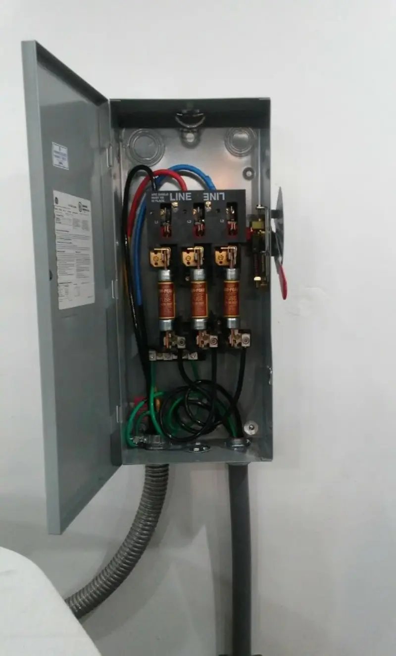 Three-phase disconnect switch installed for Smoke Detector Installation in Freetown